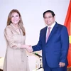 Le PM Pham Minh Chinh et Carolina Mejia, secrétaire générale du Parti révolutionnaire moderne (PRM) au pouvoir et maire de Saint-Domingue. Photo: VNA