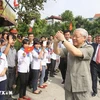 El secretario general Nguyen Phu Trong asiste al Festival de Gran Unidad Nacional en la provincia de Hung Yen en 2013. (Foto: VNA)