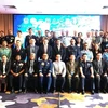 Les délégués à la 14e réunion des agents de liaison de l’ASEANAPOL. Photo : VNA