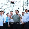 Le Premier ministre sur le chantier du terminal T3 de l'aéroport international de Tan Son Nhat à Hô Chi Minh-Ville. Photo : VNA