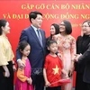 Le président Luong Cuong rencontre la communauté vietnamienne au Chili. Photo : VNA