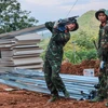 "Uncle Ho's soldiers" help local residents recover from storm and flood damage