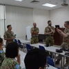 UK experts share experiences in issues related to CRSV and SEA for officers and soldiers of Level-2 Field Hospital No.6 and Engineering Unit Rotation 3 (Photo: VNA)