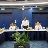 Phan Dinh Trac, Politburo member, Secretary of the Party Central Committee and Chairman of its Commission for Internal Affairs, works with FPT Software Da Nang representatives (Photo: VNA)