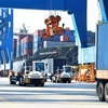 Containers at Cai Mep-Thi Vai Port in Ba Ria-Vung Tau province. AMRO staff forecast Vietnam’s economic growth may reach 6.3% for 2024 (Photo: VNA)