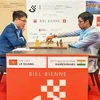 Grandmaster Le Quang Liem (L) trounces Indian player Rameshbabu Praggnanandhaa after 65 moves (Photo: Biel Chess Festival)