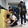 Schools in Singapore have stepped up measures to curb the usage of smartphones. (Photo: straitstimes.com)