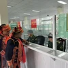 Border guards at Ma Lu Thang Border Guard Station processing exit procedures for people (Photo: baolaichau.vn).