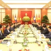 Talks between Vietnamese Party General Secretary and State President To Lam and his Lao counterpart (Photo: VNA)