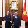 Party General Secretary and State President To Lam (R) receives Chinese Ambassador to Vietnam He Wei. (Photo: VNA)