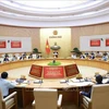 Government conference to carry out the review of the implementation of Resolution No. 18-NQ/TW, which seeks to streamline the political system for greater efficiency (Photo: VNA)