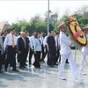 Incumbent and former Party and State leaders pay respect and lay a wreath in commemoration of martyrs at the A1 National Martyrs Cemetery in Dien Bien Dien Bien on May 6. (Photo: VNA)