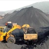 At a coal mining site (Photo: VNA)