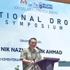 Malaysian Minister of Natural Resources and Environmental Sustainability Nik Nazmi Nik Ahmad speaks at the symposium. (Photo: Bernama)