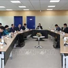 At the working session between a delegation from Vietnam's Ministry of Home Affairs (MoHA) and the Republic of Korea (RoK)'s National Human Resources Development Institute (NHI) on July 17. (Photo: VNA)