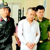 Nguyen Tinh (central), one of the four suspect, is arrested (Photo: Thanh Hoa Police) 