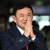 Ex-Prime Minister Thaksin Shinawatra returns to Thailand after 15 years in exile on August 22, 2023. (Photo: AFP/VNA) 