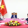 Prime Minister Pham Minh Chinh (centre) at a phone talks with his Thai counterpart Paetongtarn Shinawatra on August 29. (Photo: VNA)