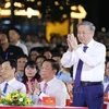 Party General Secretary and State President To Lam attends the special artistic programme titled "Loi Nguoi de lai (The Words He Left Behind)". (Photo: VNA)