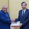 Chairman of the Da Nang municipal People’s Committee Le Trung Chinh (R) and Cuban Ambassador to Vietnam Orlando Hernández Guillén at their working session in Da Nang on September 6. (Photo: VNA)