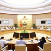 Prime Minister Pham Minh Chinh chairs a law-building session of the Government in Hanoi on September 23. (Photo: VNA)