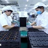 An electronic circuit board production line at Nexcon Vietnam Co. Ltd, a Korean-Invested company in Bac Ninh province. (Photo: VNA)