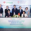 Representatives of VPBank and JBIC sign a green credit contract on October 9 in Hanoi. (Photo courtesy of VPBank) 