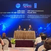 Ramla Khalidi, United Nations Development Programme (UNDP), and Tran Thi Hong Minh, President of the Central Institute for Economic Management. (Photo: VNA) 