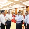 From left: Party General Secretary To Lam (3rd), Prime Minister Pham Minh Chinh, and other delegates at the meeting (Photo: VNA)