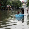 Floodwaters inundate Duong Van An street, Xuan Phu ward, Hue city, on November 25. (Photo: VNA)