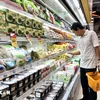 A shopper in Ho Chi Minh City (Photo: VNA)