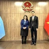 El embajador Dang Hoang Giang (derecha) y la directora de la División de Asociaciones Públicas de UNICEF, June Kunugi (Foto: VNA)
