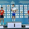 Nguyen Thi That (izquierda) en el podio por la plata en el 43º Campeonato Asiático de Ciclismo en Ruta el 11 de junio en Alma Alta, Kazajstán (Fuente: vietnamnews.vn)