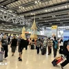 Pasajeros en el aeropuerto de Suvarnabhumi, Tailandia. (Foto: VNA)