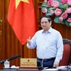 El primer ministro Pham Minh Chinh interviene en la reunión (Fuente: VNA)