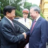 El secretario general del Partido Comunista y presidente, To Lam, preside una ceremonia de bienvenida a su homólogo laosiano, Thongloun Sisoulith, en Hanoi. (Foto: VNA)