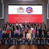 Los participantes posan para una foto de grupo en la reunión (Foto: VNA)