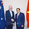 El primer ministro vietnamita, Pham Minh Chinh (derecha), y su homólogo australiano, Anthony Albanese, se reúnen en Laos el 11 de octubre. (Foto: VNA)