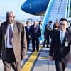 Ceremonia de bienvenida al presidente de la Asamblea Nacional del Poder Popular de Cuba, Esteban Lazo Hernández, en el aeropuerto internacional de Noi Bai (Foto: VNA)