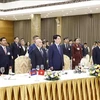 El presidente vietnamita, Luong Cuong, y el rey camboyano, Norodom Sihamoni, y delegados asisten al banquete. (Foto: VNA)