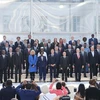 Party General Secretary and State President To Lam, French President Emmanuel Macron, heads of Francophone member delegations pose for a group photo (Photo: VNA)