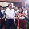 Le président Tô Lâm à la célébration de la Journée "Tout le peuple défend la sécurité nationale" dans le quartier de Cua Dông, arrodissement de Hoa Kiêm, à Hanoi. Photo : VNA