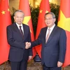 Le secrétaire général et président vietnamien rencontre le PM chinois