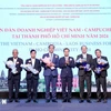 Les délégués au Forum d'affaires Vietnam-Cambodge-Laos de 2024. Photo: VNA