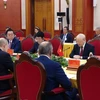 越共中央总书记阮富仲同俄罗斯总统普京举行会谈