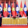Vietnam’s President To Lam, Party General Secretary and President of Laos Thongloun Sisoulith witness the agreement announcement in Vientiane on July 11, 2024. Photo courtesy of Vietjet.
