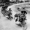 Pack-bikes and manual cannon haul to the front (Photo: VNA)
