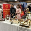 The Vietnamese booth at the charity fair. (Photo: VNA)