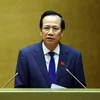Minister of Labour, Invalids and Social Affairs Dao Ngoc Dung addresses the National Assembly's 7th session (Photo: VNA)