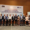 Distinguished guests and speakers take a group photo during the 'Vietnam 2045 Report' conference on May 21 (Photo: VNA)